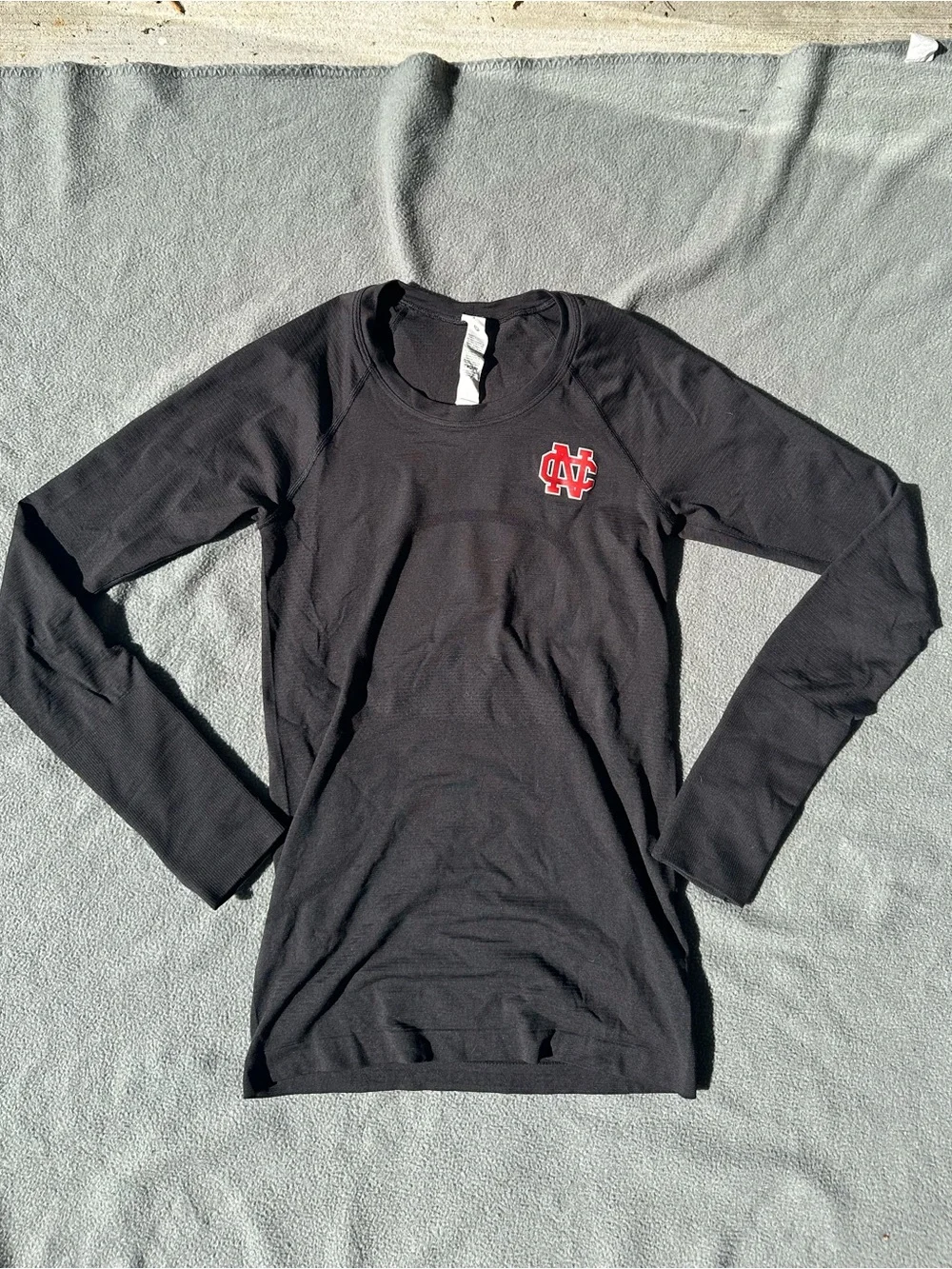 lululemon athletica Black Long Sleeve Top with Red NC Chest Logo